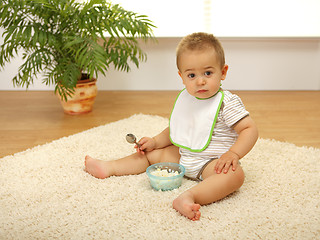 Image showing Baby boy eating