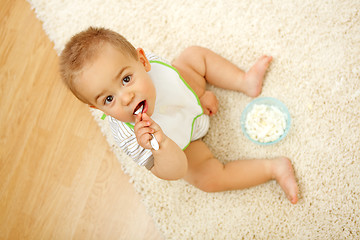 Image showing Baby boy eating