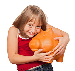 Image showing Girl loving her piggy bank