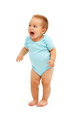 Image showing Joyful baby looking up