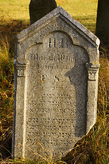 Image showing detail of tomb on forgotten and unkempt Jewish cemetery with the strangers