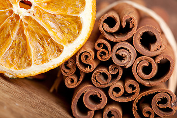 Image showing Cinnamon and dried Orange
