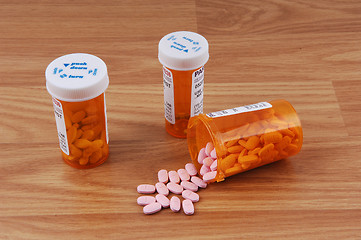 Image showing Three bottle pills.