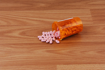 Image showing Orange pills.