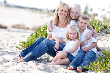 Image showing Attractive Mom and Her Cute Children at The Beach