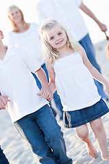 Image showing Adorable Little Girl Walking With Her Family