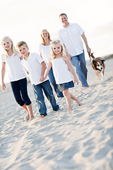 Image showing Adorable Little Girl Leads Her Family on a Walk