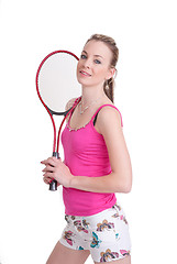 Image showing pretty girl with tennis racket on white