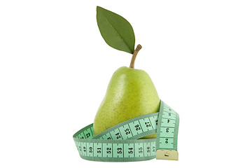 Image showing green pear with leaf and measurement tape