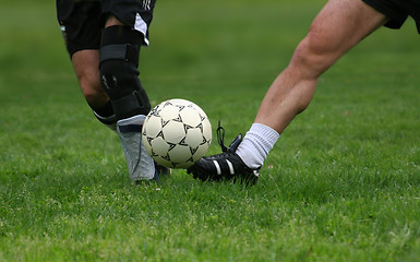 Image showing Two men playing soccer