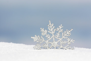 Image showing snowflake in snow