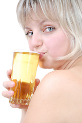 Image showing beautiful blond wgirl drinking beer