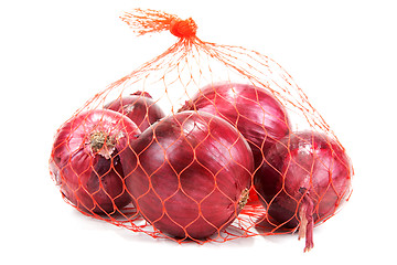 Image showing Red onion in packing from red net