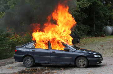 Image showing Fire in a car.