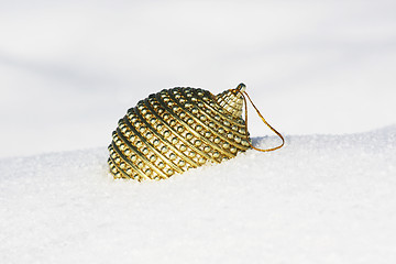 Image showing christmas bauble in snow