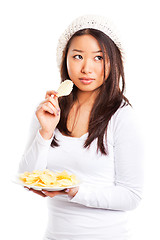 Image showing Eating potato chips