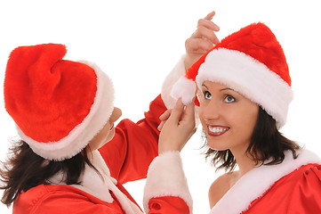 Image showing two women santa