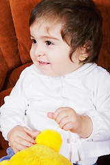 Image showing Cute baby girl with soft toy
