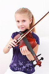 Image showing Little girl playing violin