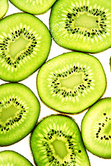 Image showing Sliced Kiwifruit isolated on white studio shot 