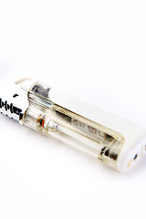 Image showing White cigarette lighter.