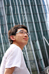 Image showing asian young, handsome business man at the office building 