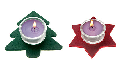 Image showing Red star and green pine tree  Christmas decorations with candles