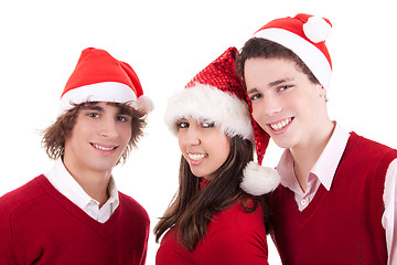 Image showing Happy christmas teens, isolated on white background, studio shot.