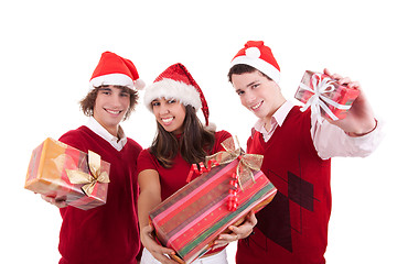 Image showing Happy christmas teens with gifts,