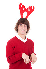 Image showing happy young man wearing reindeer horns