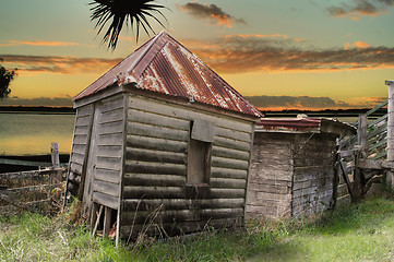 Image showing Dilapidated Huts By The Water