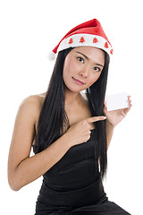 Image showing woman with santa claus hat and blank business card