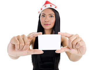 Image showing woman with santa claus hat and blank business card