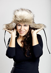 Image showing Girl with a fur hat