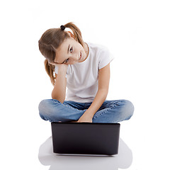 Image showing Little student girl with a laptop