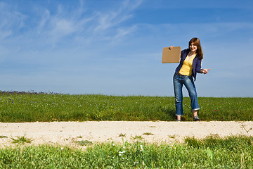 Image showing Hitch hiking girl