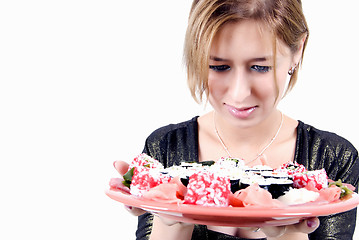 Image showing young girl  with sushi set