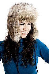 Image showing Girl with a fur hat