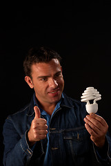 Image showing Thumbs up to energy saving