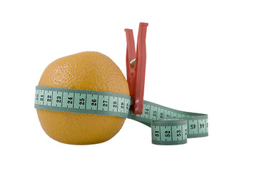 Image showing Fresh orange with measuring tape