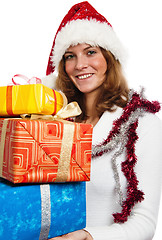 Image showing Portrait of the young woman with New Year's gifts, it is isolate