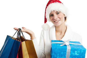 Image showing Portrait of the young woman with New Year's gifts, it is isolate