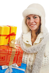 Image showing Portrait of the young woman with New Year's gifts, it is isolate