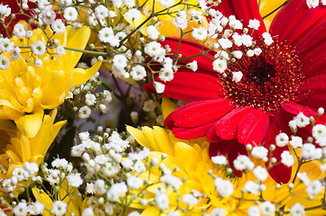 Image showing Autumn bouquet of flowers a close up, a background