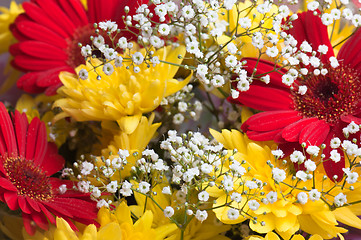 Image showing Autumn bouquet of flowers a close up, a background