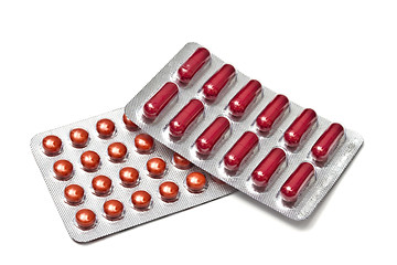 Image showing Red pills and capsules