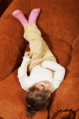 Image showing Relaxed girl in big chair