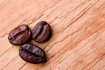 Image showing three fried coffee beans