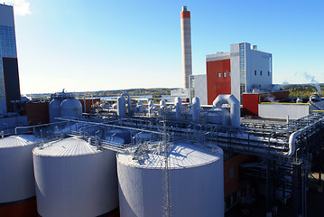 Image showing Modern industrial factory against blue sky