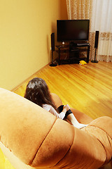 Image showing Girl watching television